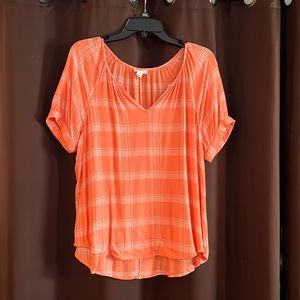 ANA short sleeve top. Orange and white size Large